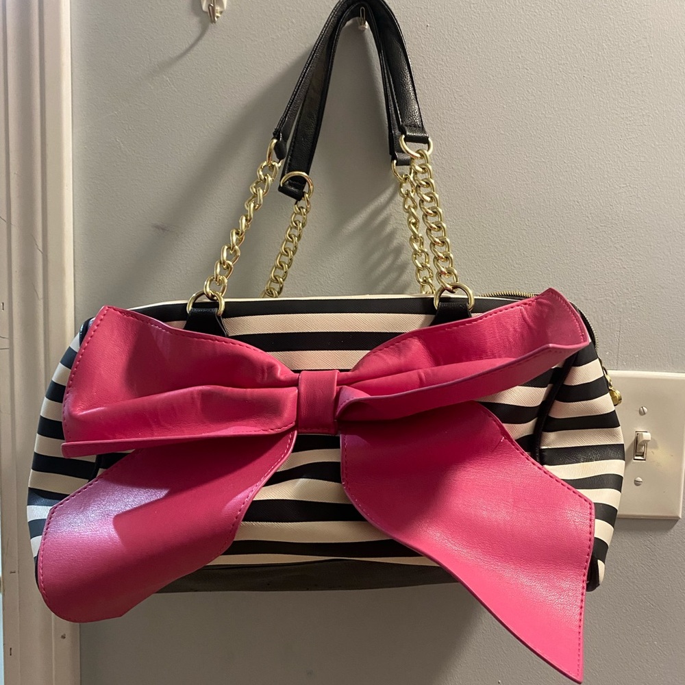 Betsey Johnson handbag! Wonderful condition. Silky strawberry inside. No stains.